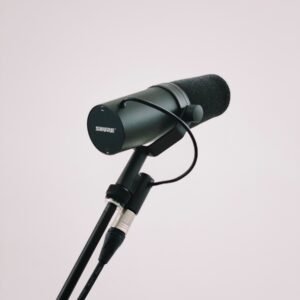 black microphone with stand on white background
